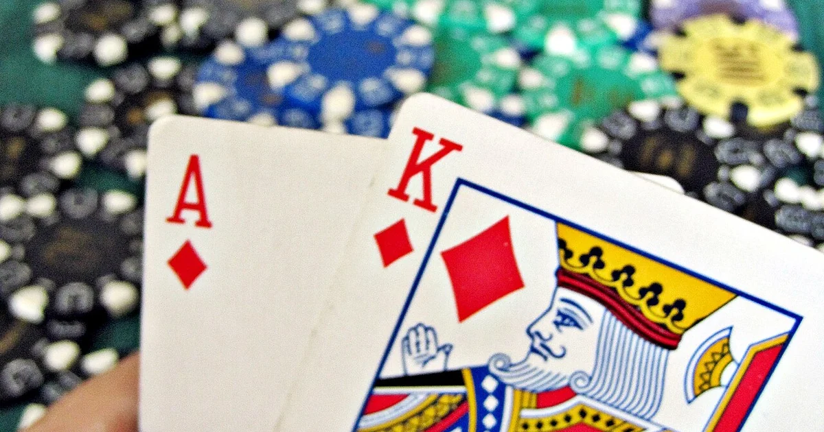 A winning hand of blackjack (21) with a large pile of poker chips on the table. Like much of our work, we have put all these images in the public domain. Feel free to use them but please credit out site as the source if you do: TaxRebate.or